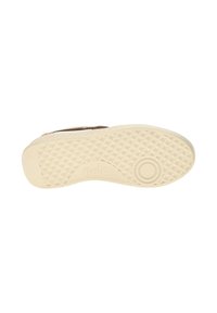 Semelle de chaussure en caoutchouc ; texturée avec des motifs géométriques ; couleur crème ; présente un accent circulaire et le logo de la marque.