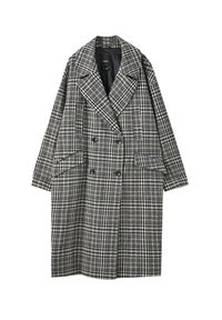 Kaksirivinen villakangastakki, jossa on mustavalkoinen ruutukuvio, suuret huiputetut kaulukset, kaksi etutaskua ja rento istuvuus.