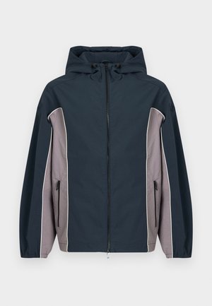 Marineblaue und graue Kapuzenjacke mit Frontreißverschluss, seitlichen Reißverschlusstaschen und elastischen Bündchen.