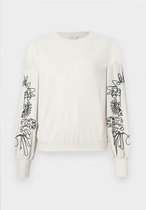 White long-sleeve sweatshirt with black abstract floral embroidery on sleeves and ribbed cuffs and hem.