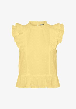 Gul bluse laget av teksturert stoff, med volangerm og peplumnederdel. Lukking bak med nøkkelhullåpning.