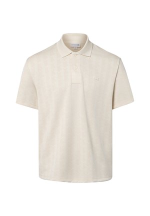 Beige polo met korte mouwen, twee knopen, subtiel patroon en klein geborduurd logo op de linkerborst.