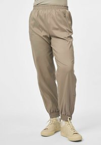 Girlfriend Collective Spodnji deli trenirk - silver mink