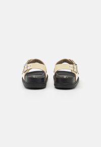 Birkenstock CANNES - Sandales - butter