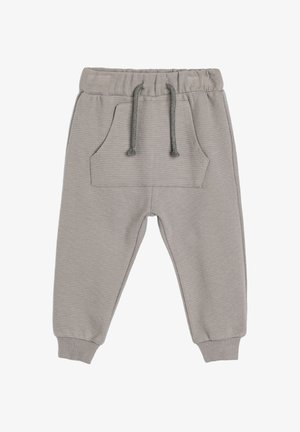 Graue gestreifte Jogginghosen mit einem elastischen Bund, Kordelzügen und einer frontalen Tasche. Mit schmalen Bündchen am Knöchel.