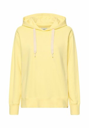 Sweat à capuche jaune en tissu doux, doté d'une poche avant, d'une fermeture à cordon et de poignets côtelés. Design simple et décontracté avec une capuche.
