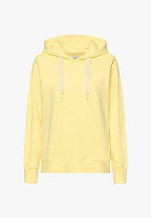 Yellow hoodie made of soft fabric, featuring a front pocket, drawstring closure, and ribbed cuffs. Simple, relaxed design with a hood.