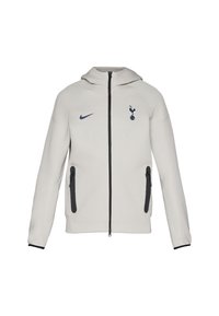 Light gray zip-up hoodie, featuring a Nike logo and Tottenham emblem, with black zippers and accents, smooth fabric, and hooded design.
