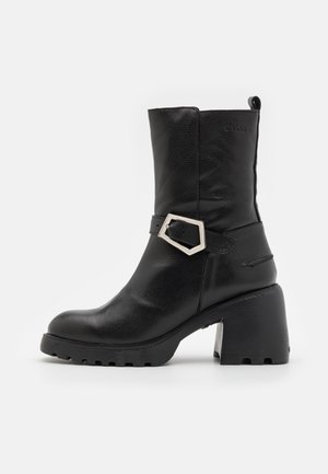 WONDERS, Bottines - black