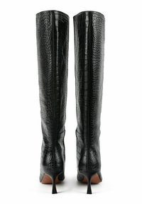 Black knee-high boots made of glossy, textured crocodile-patterned leather with a narrow stiletto heel and pointed toe design.