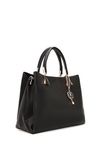 Black textured leather handbag with dual handles and a gold chain charm featuring a flower and tassel accents.