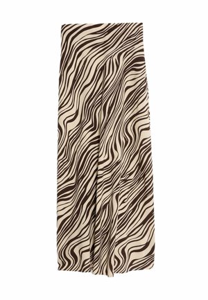 Jupe beige avec des rayures noires ondulées, fabriquée en tissu lisse. Elle possède des plis et une taille structurée. Sa longueur atteint le mollet.