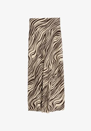 Jupe beige avec des rayures noires ondulées, fabriquée en tissu lisse. Elle possède des plis et une taille structurée. Sa longueur atteint le mollet.