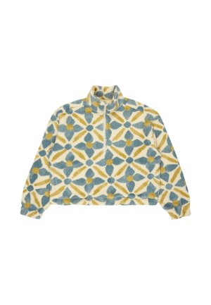 Pullover in fleece con zip a metà, caratterizzato da un motivo geometrico in blu, giallo e bianco su uno sfondo testurizzato color crema.
