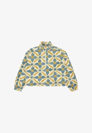 Fleece pullover met een half-rits, voorzien van een geometrisch patroon in blauw, geel en wit op een gestructureerde crèmekleurige achtergrond.