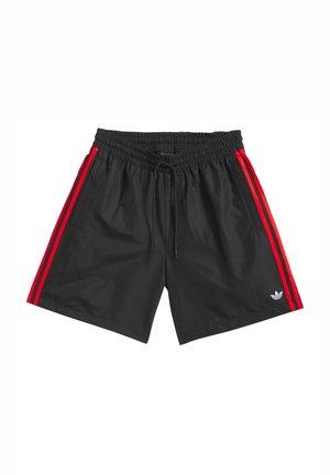 Černé šortky z lehkého materiálu s červenými pruhy na bocích a elastickým pasem se stahovací šňůrkou. Ikonické logo na lemu.