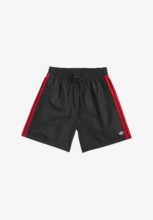 Černé šortky z lehkého materiálu s červenými pruhy na bocích a elastickým pasem se stahovací šňůrkou. Ikonické logo na lemu.