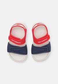 New Balance IOSPS UNISEX - Sandalen - true red