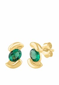 Náušnice v zlatej farbe s oválnymi zelenými drahokamami, zasadené do vlnitého dizajnu, ktorý zvýrazňuje brúsenie kameňa a pridáva textúru.