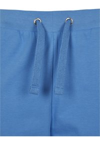Urban Classics LADIES OPEN EDGE TERRY TURN UP PANTS - Pantaloni sportivi - horizonblue