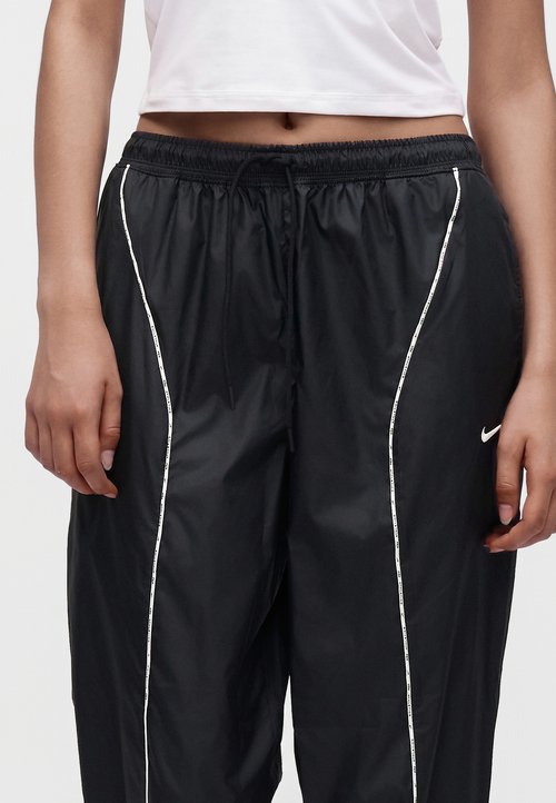 Nike ATHLETICS - Tracksuit bottoms - black/sail — foto 6