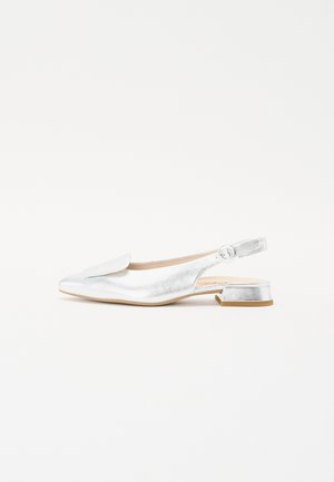Metallic silver slingback shoe with a flat heel, pointed toe, and a rounded strap with a button detail. Smooth texture with minimal embellishments.
