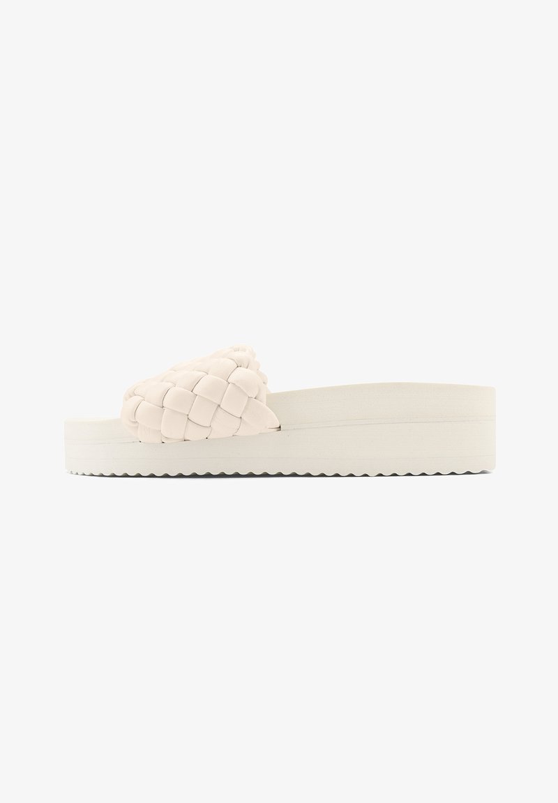 Woven beige slide sandal with a thick white sole, featuring a braided strap and textured surface for grip.