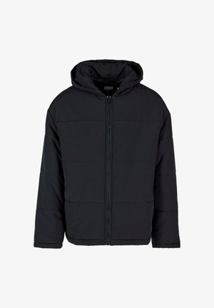 Mustmust koosvetiga must polsterdatud jope, millel on lukuga esiosa, kapuuts ja laiad varrukad. Omab horisontaalseid õmblusmustreid ja sujuvat tekstuuri.