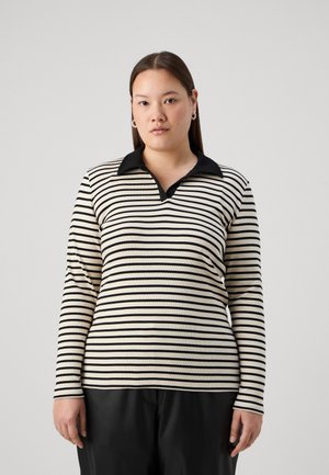 Stripet langermet polo skjorte i svart og krem, med svart krage og teksturert stoff, i en tettsittende silhuett.