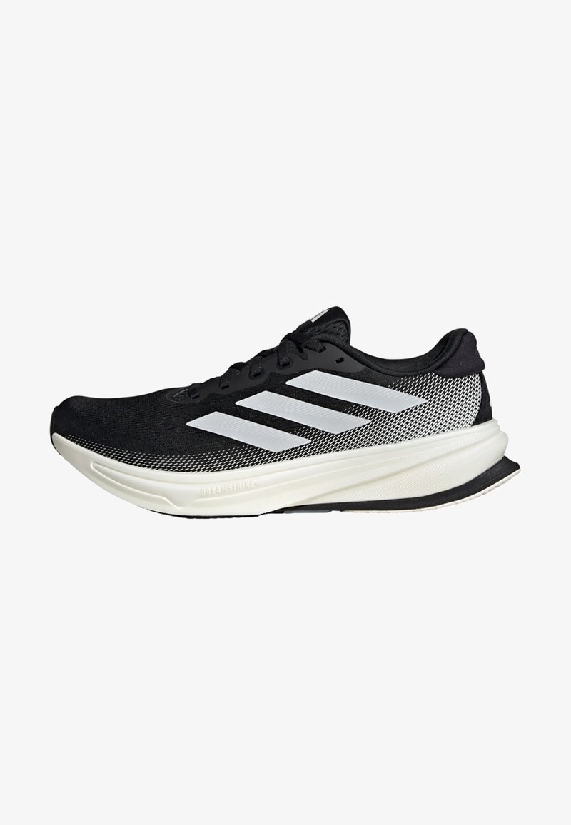 Black athletic shoe with a mesh design, featuring white stripes, a rounded toe, and a textured sole for grip and support.