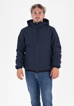 Giacca a zip blu navy con cappuccio, polsini elastici e due tasche laterali. Realizzata in un materiale liscio e resistente all'acqua.