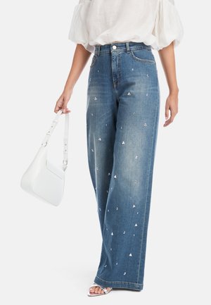 WARRI - Flared Jeans - vintage blue