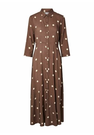 Robe marron à manches longues avec des pois blancs et un boutonnage sur le devant. Fabriquée en tissu léger, avec un col et une longueur midi.