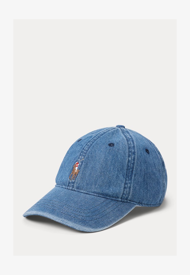 Blue denim baseball cap with stitched logo of a polo player on horseback on the front panel, curved brim, and ventilation holes.