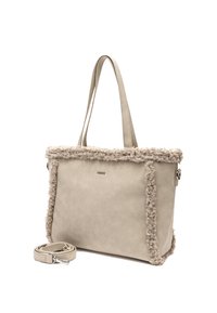 Bež torba za nošenje s lažnim krznom na rubu, glatke teksture i dva remena. Uključuje uklonjivi remen za rame koji se slaže. Ima suptilan detalj s logotipom.