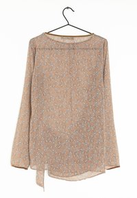 Blusa a maniche lunghe color marrone chiaro, con un motivo floreale, tessuto morbido, scollatura rotonda e dettaglio annodato all'orlo.