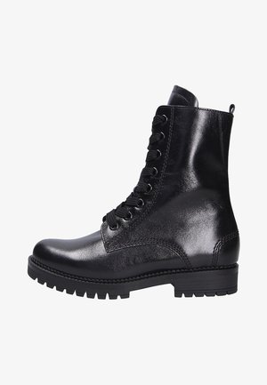 Black leather ankle boot featuring a lace-up front, round toe, textured surface, and a durable rubber sole with a low heel.