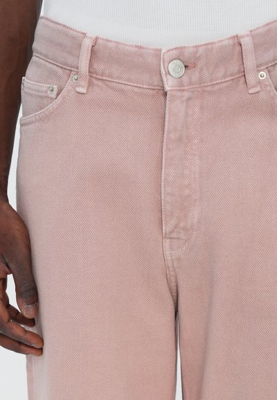 Pink denim pants with a straight cut, featuring a front button closure, belt loops, and classic five-pocket design with a textured finish.