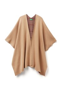 Beige oversize pončo s výstřihem do V, s kostkovaným vnitřkem v červené a hnědé barvě. Měkká tkanina s volnými rukávy a otevřenými stranami.