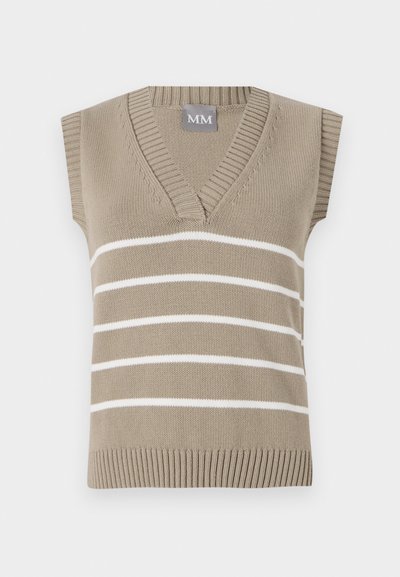 Bež ilma varrukateta kudum, millel on v-kujuline kaelus, horisontaalsete valgete triipudega ja ribaga ääristatud allääres. Kaeluses on silt "MM".