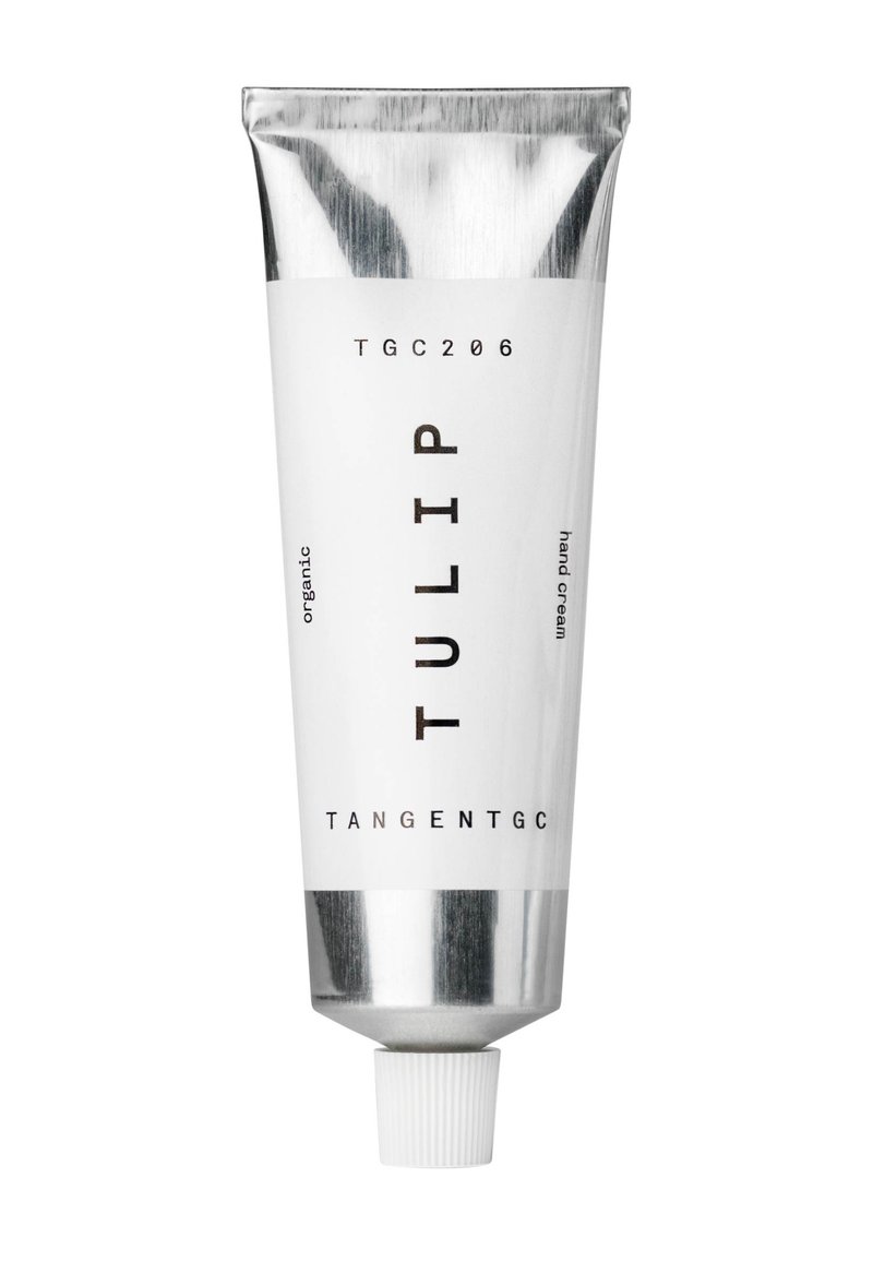 Weißes Metallrohr mit einem silbernen Drehverschluss, beschriftet mit "TULIP" und "TANGENTGC". Es enthält schwarzen Text, der es als organische Handcreme beschreibt.