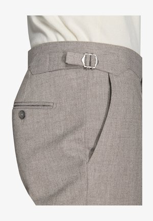 Grey textured trousers with a side pocket, belt loops, and a metal buckle accent. Designed with clean lines and tailored fit.