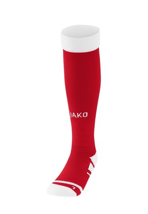 Rød knæstrømpe med hvid ribbet kant og logo. Har tekstureret stof og kontrasterende hvide striber nær foden.