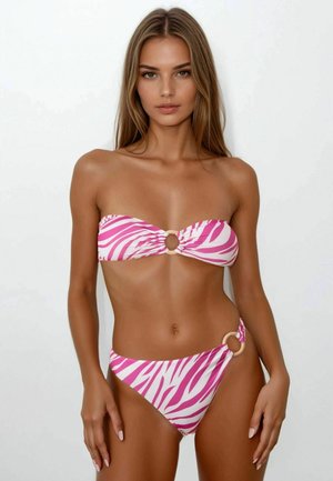 Pink and white zebra print bikini with a strapless top featuring a circular accent. The bottom has a side ring detail and a smooth texture.