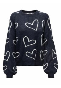 Marinblå stickad tröja med vita hjärt-mönster, rund halsringning och långa ärmar med ribbade muddar och nederkant. Mjuk textur, avslappnad passform.