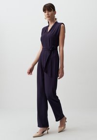 Jimmy Key V-NECK BELTED STYLISH WOVEN JUMPSUIT - Jumpsuit - dark blue