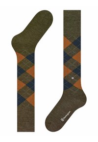 Calze argyle verdi con motivi a rombi in arancione e blu navy. Realizzate in materiale morbido con dettagli del logo sulla punta.