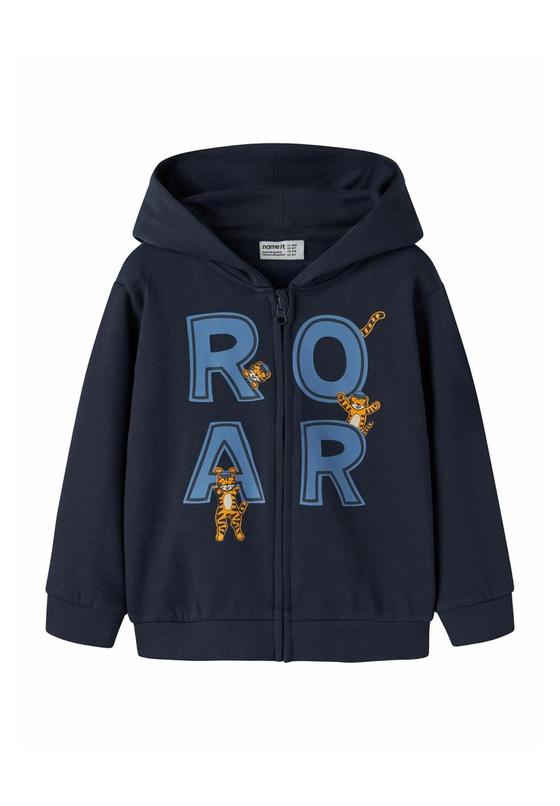 Sudadera con cremallera en navy hecha de una mezcla de algodón, con grandes letras azules que dicen "ROAR" e ilustraciones de tigres juguetones en el frente. Presenta una capucha y puños acanalados.