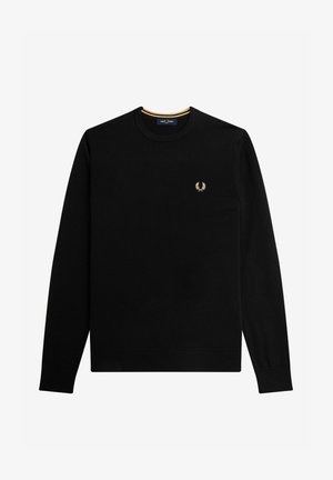 Pull noir à manches longues, col rond, fabriqué en tissu doux. Présente un petit logo doré sur la poitrine et un bord de col rayé jaune.