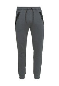 Grijze joggingbroek met elastische tailleband, verstelbare trekkoord en twee zakken met rits. Voorzien van gladde stof en contrasterende zwarte accenten.